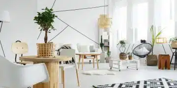 Scandinavian style living room with white furniture and wooden decoration